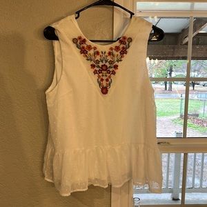 BRAND NEW white Francesca’s blouse with embroidered flowers. HAS TAGS. Size S